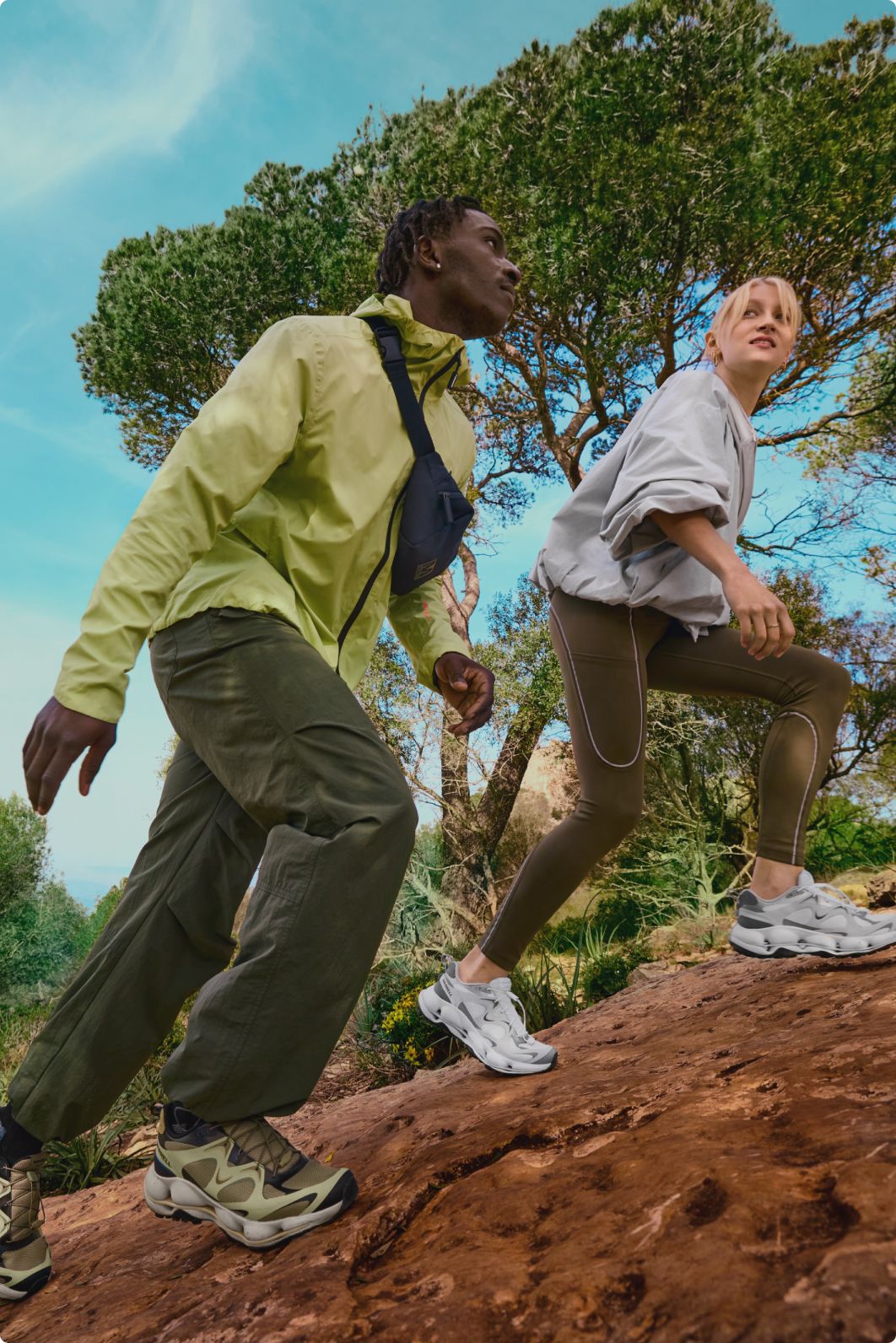 Man in woods wearing Merrell hiking boots